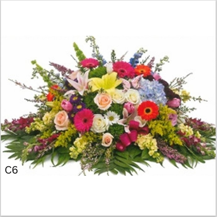 Bold Spring Bloom Casket Spray